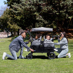 Convertible 4-Kid Wagon Stroller with 5 Seating Options, Canopy, Storage, Cooler & Safety Harnesses